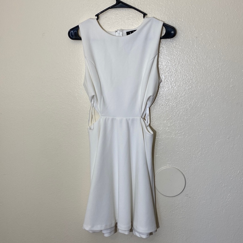 Lulu’s toast to you sleeveless white cut out skater mini dress - Picture 2 of 12